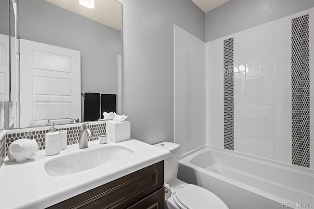 11046 Pastel Pt, Parker, CO 80134 - bathroom with a textured wall, tasteful backsplash, toilet, vanity, and shower / bathtub combination