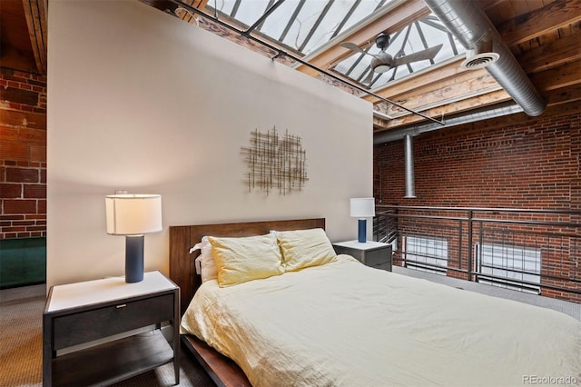 1515 N Ogden St Unit 7, Denver, CO 80218 - bedroom featuring carpet flooring, brick wall, and a high ceiling