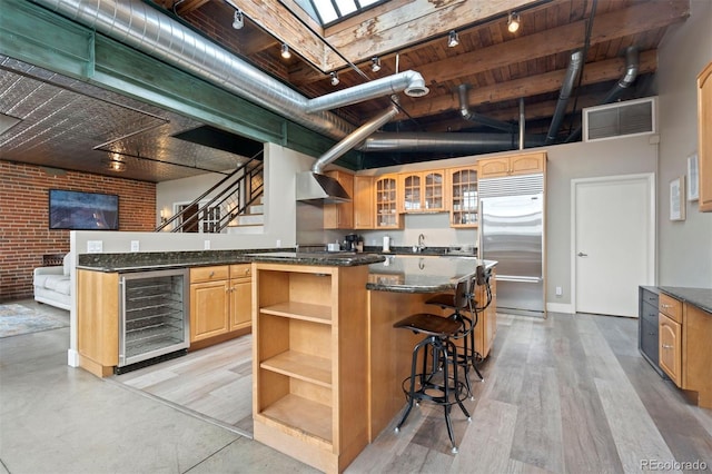 1515 N Ogden St Unit 7, Denver, CO 80218 - kitchen featuring visible vents, open shelves, wine cooler, built in fridge, and rail lighting
