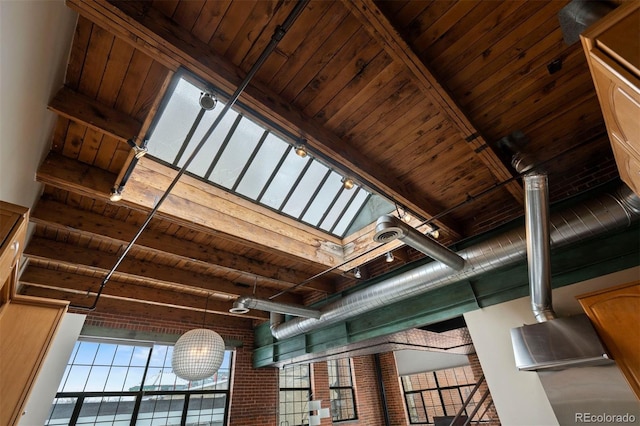 1515 N Ogden St Unit 7, Denver, CO 80218 - room details featuring beam ceiling and wood ceiling