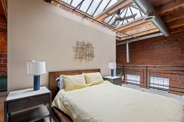 1515 N Ogden St Unit 7, Denver, CO 80218 - bedroom with brick wall, visible vents, and a high ceiling