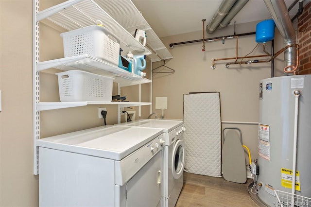 1515 N Ogden St Unit 7, Denver, CO 80218 - laundry room with separate washer and dryer, laundry area, wood finished floors, and gas water heater