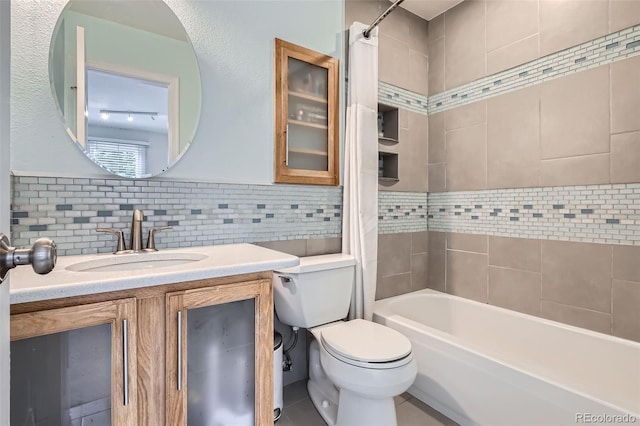 9962 Stratford Ln, Highlands Ranch, CO 80126 - full bath featuring shower / bath combo, vanity, and decorative backsplash