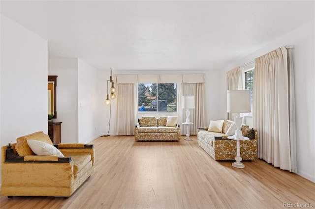 8484 E Radcliff Ave, Denver, CO 80237 - living area with wood finished floors and baseboards