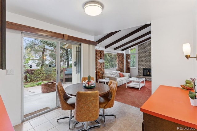 8484 E Radcliff Ave, Denver, CO 80237 - dining space with light tile patterned floors, light carpet, and plenty of natural light