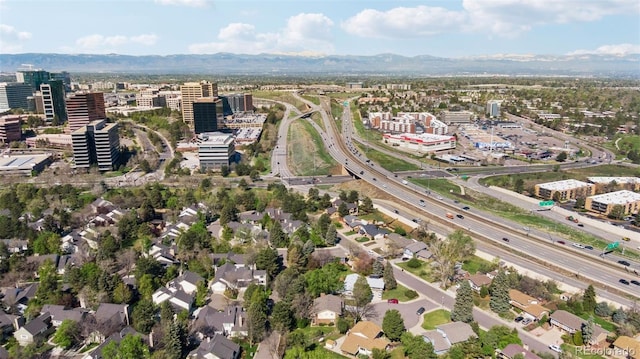 8484 E Radcliff Ave, Denver, CO 80237 - aerial view of property's location featuring a major roadway, a mountain backdrop, and nearby urban area