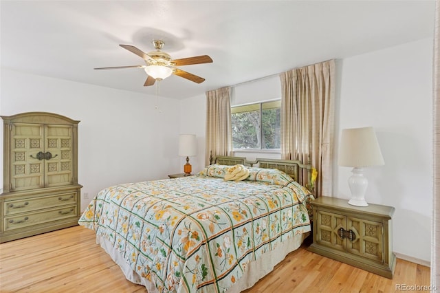 8484 E Radcliff Ave, Denver, CO 80237 - bedroom featuring wood finished floors and ceiling fan