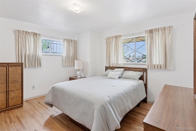 8484 E Radcliff Ave, Denver, CO 80237 - bedroom featuring wood finished floors