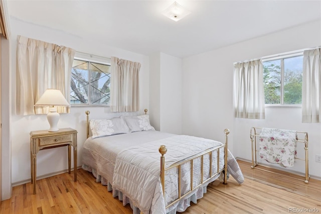 8484 E Radcliff Ave, Denver, CO 80237 - bedroom with wood finished floors