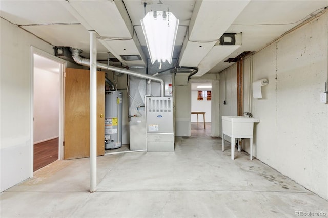 8484 E Radcliff Ave, Denver, CO 80237 - unfinished basement with gas water heater and heating unit