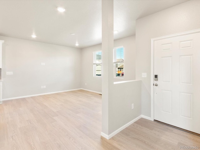 foyer entrance featuring light hardwood / wood-style flooring