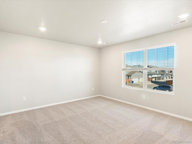 empty room with carpet floors