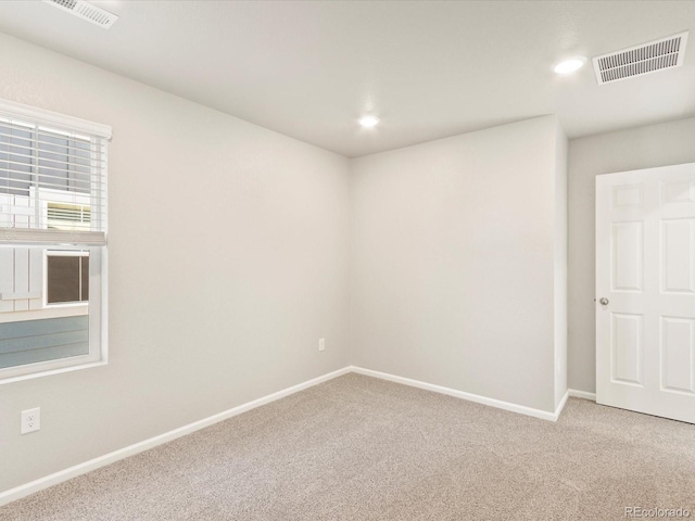 view of carpeted spare room