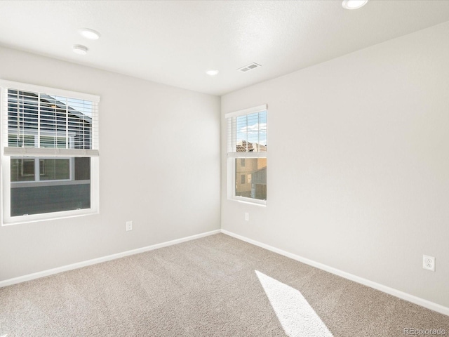 empty room featuring carpet flooring