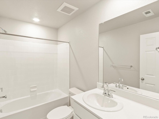 full bathroom with washtub / shower combination, vanity, and toilet