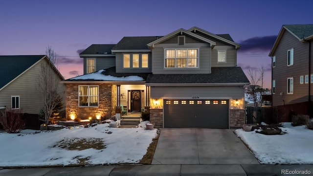 view of front of property with a garage