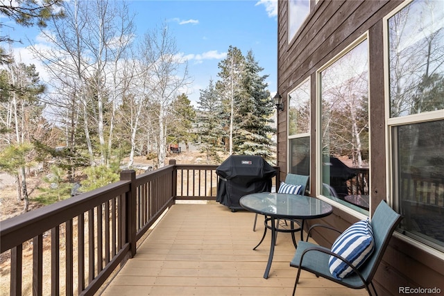 wooden terrace with grilling area