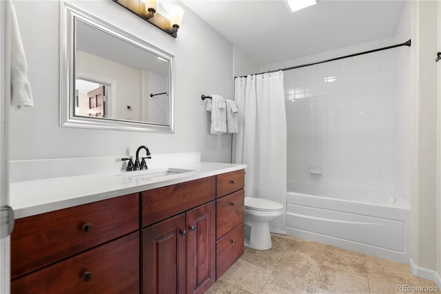 full bathroom featuring shower / bath combo, vanity, and toilet