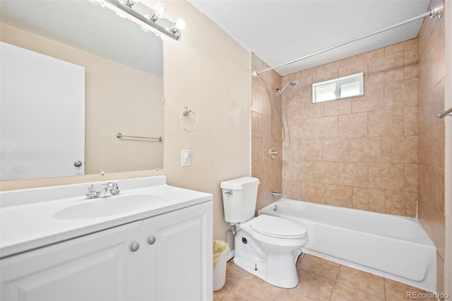 bathroom featuring tile patterned flooring, shower / bath combination, toilet, and vanity