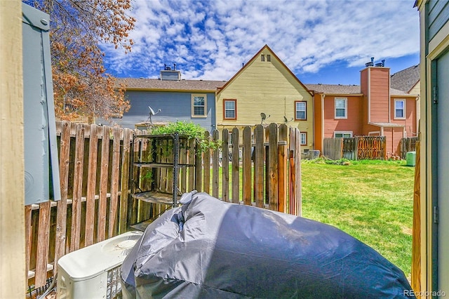 deck with fence and a lawn