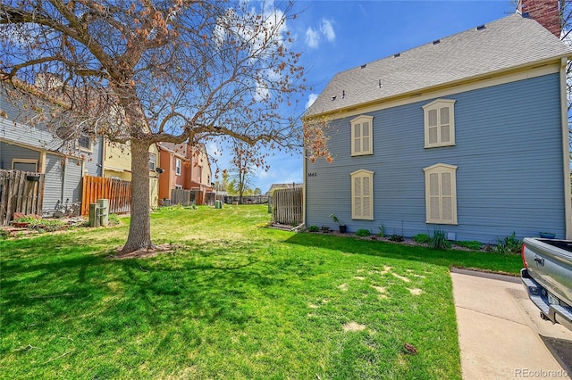 view of yard with fence