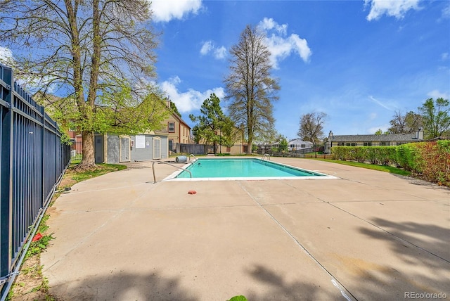 view of pool featuring a fenced in pool, a patio area, and fence