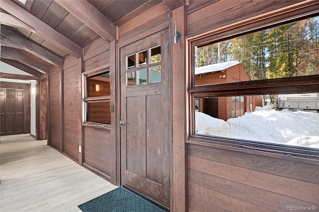 view of snow covered property entrance