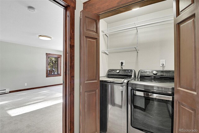 laundry area with carpet and washer and clothes dryer