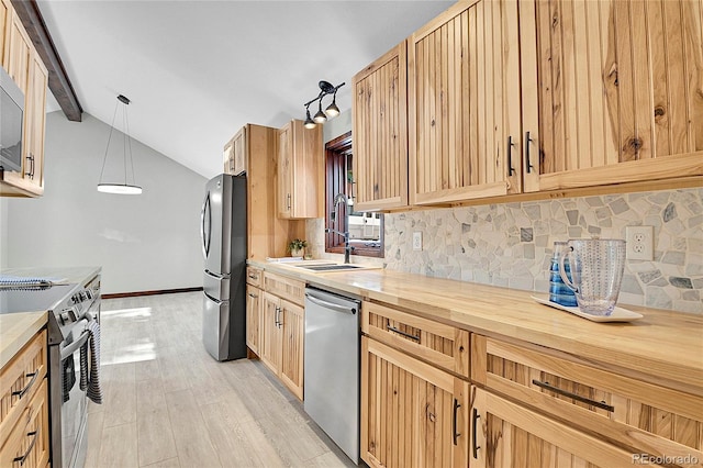 kitchen with decorative backsplash, light wood-type flooring, stainless steel appliances, pendant lighting, and lofted ceiling with beams