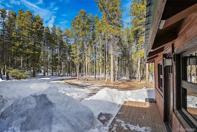 view of yard layered in snow