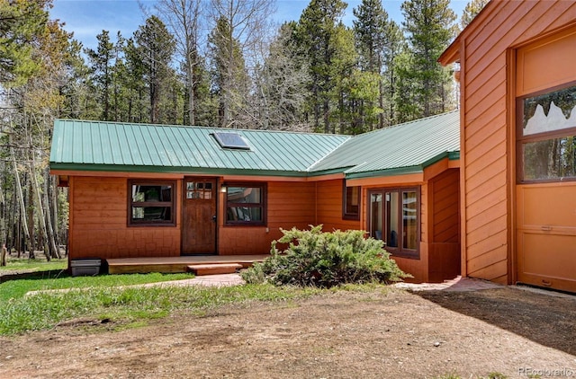 9123 Booker Ln, Conifer, CO 80433 - rustic home with metal roof