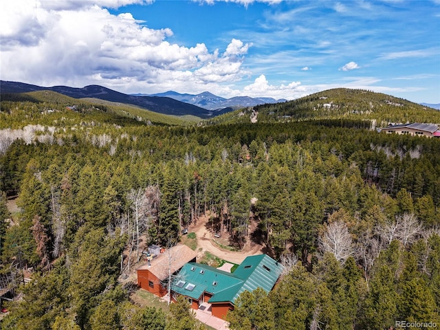 9123 Booker Ln, Conifer, CO 80433 - birds eye view of property featuring a mountain view and a forest view