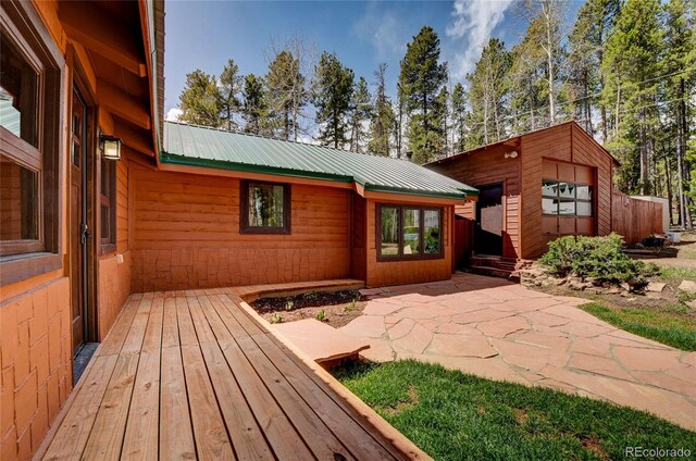 9123 Booker Ln, Conifer, CO 80433 - wooden terrace featuring a patio