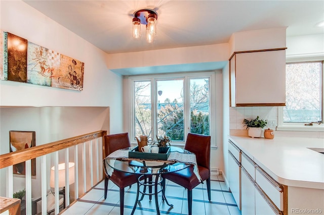 dining room with light tile patterned floors