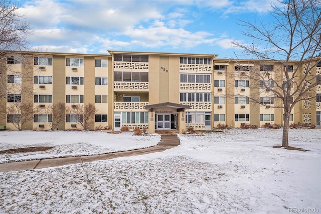 view of snow covered property