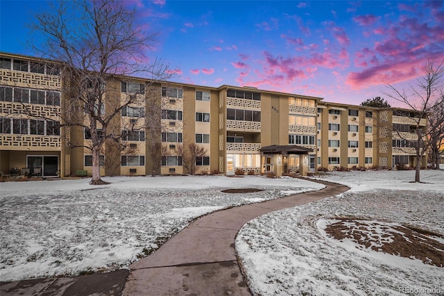 view of snow covered property