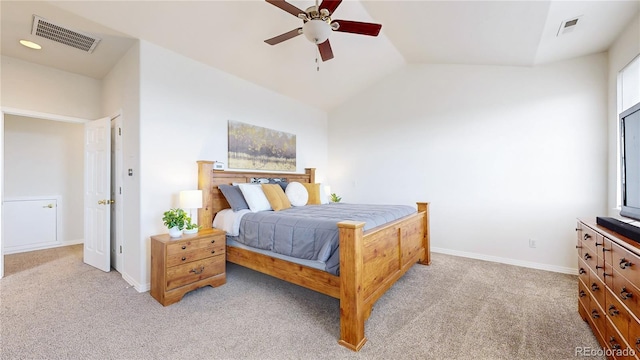 bedroom with visible vents, vaulted ceiling, light carpet, and baseboards