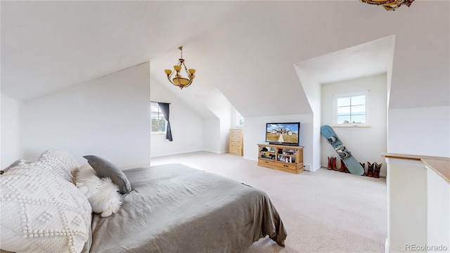 bedroom featuring a chandelier, light colored carpet, multiple windows, and vaulted ceiling