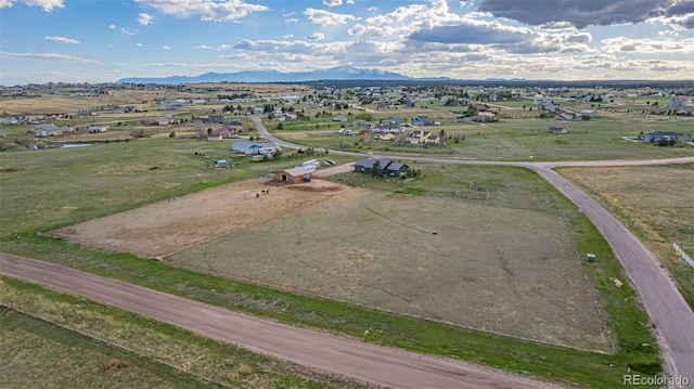 bird's eye view with a mountain view and a rural view