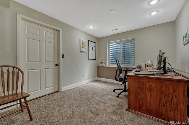 carpeted office with recessed lighting, baseboards, and a textured wall