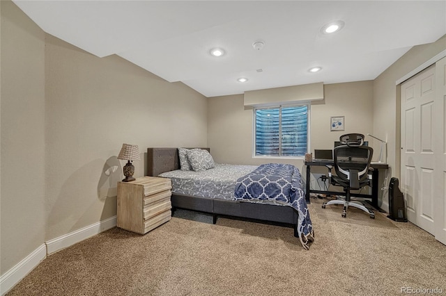 bedroom featuring recessed lighting, carpet, and baseboards