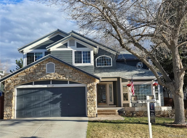 19346 E Prentice Ln, Centennial, CO 80015 - view of front of house with driveway and stone siding