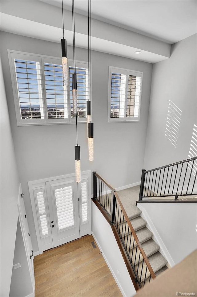 foyer with light hardwood / wood-style floors