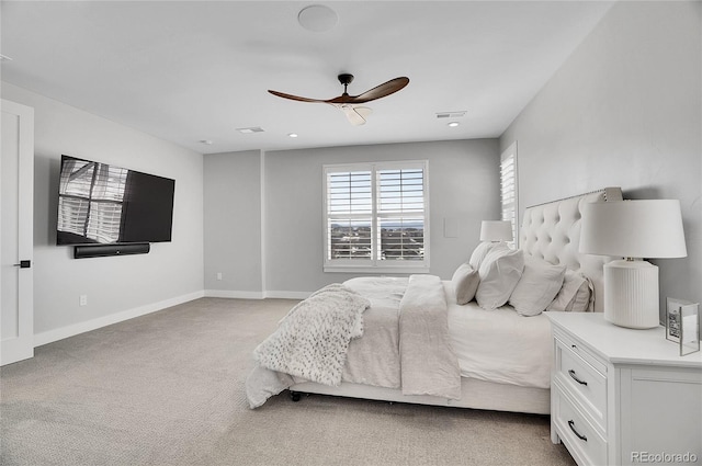 bedroom featuring ceiling fan and light colored carpet