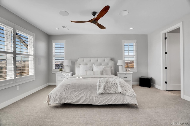 bedroom with light colored carpet and ceiling fan