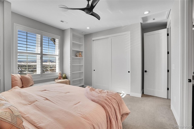 carpeted bedroom with ceiling fan