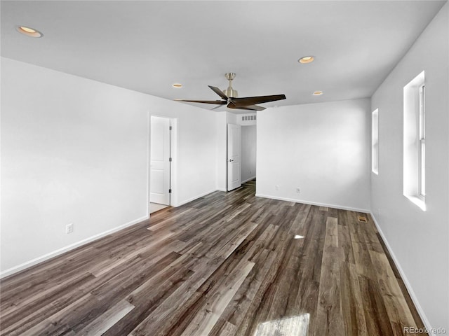 unfurnished room with recessed lighting, baseboards, dark wood-style floors, and ceiling fan