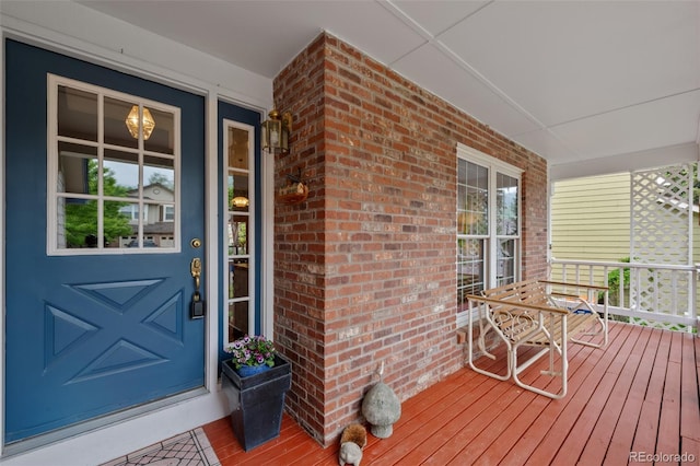 18 Blue Sage, Littleton, CO 80127 - entrance to property with a porch and brick siding