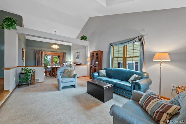 18 Blue Sage, Littleton, CO 80127 - carpeted living room with high vaulted ceiling