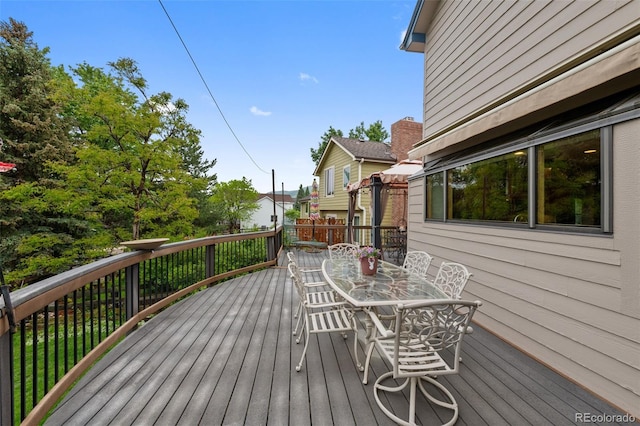 18 Blue Sage, Littleton, CO 80127 - wooden deck with outdoor dining area